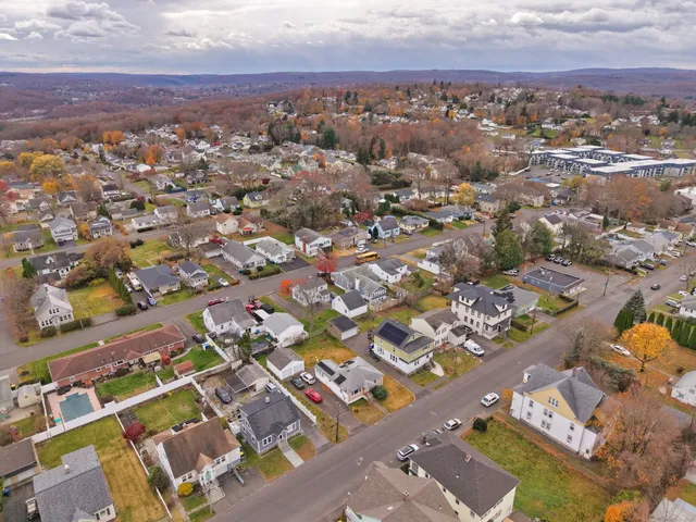 an aerial view of a city with lots of residential buildings
