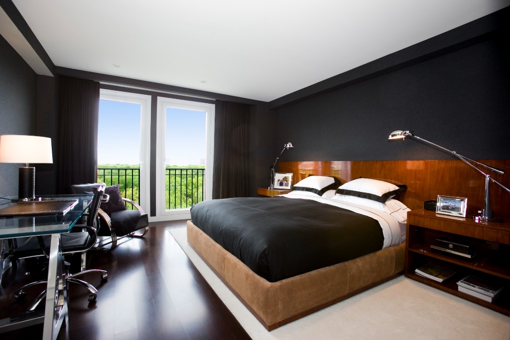 160 Central Park South, Unit 1005 Manhattan, NY 10019 - Photo 6 of 21 a bedroom with a bed and a desk