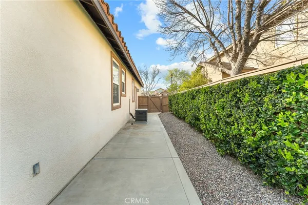 a house view with a garden space
