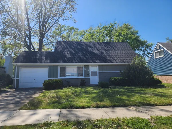 front view of house with a yard