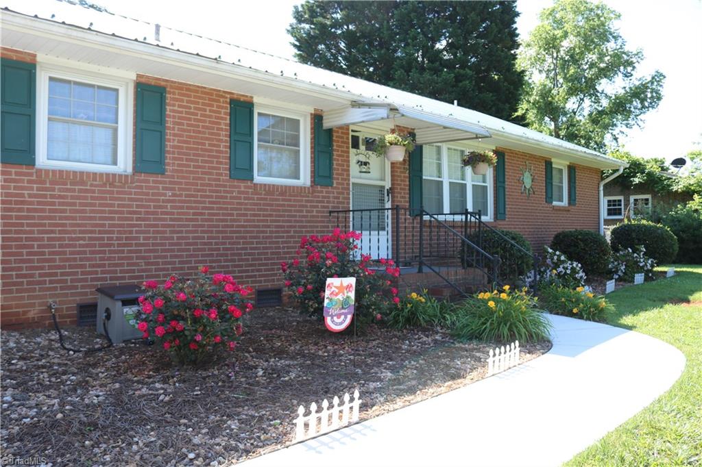5133 Yukon Road Walkertown, NC 27051 - Photo 2 of 20 The landscaping is absolutely beautiful.
