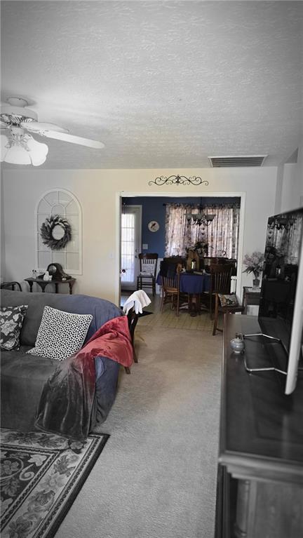 73 Cotton Bend Cartersville, GA 30120 - Photo 4 of 9 a bedroom with furniture and a chair