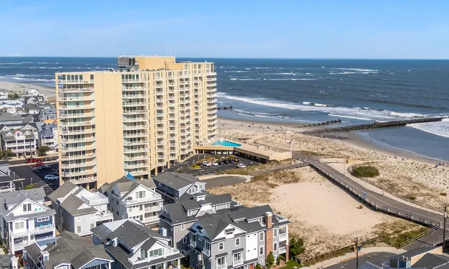 a front view of a building with glass windows