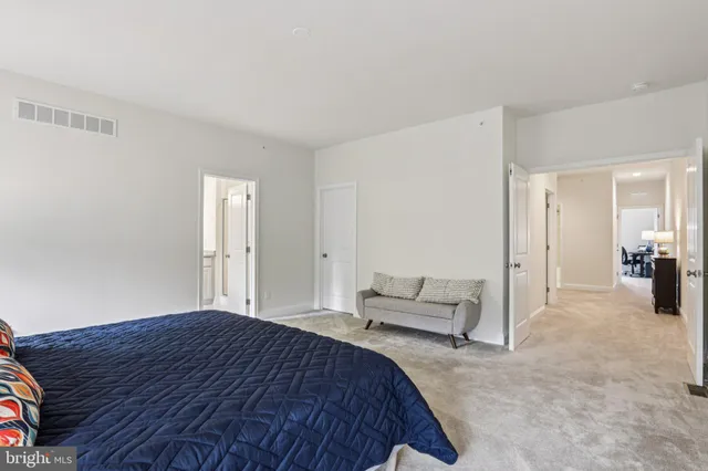 a bathroom with a granite countertop sink a mirror and a