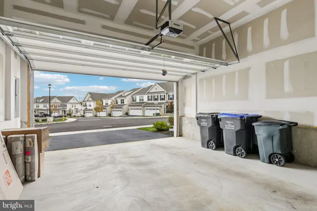 a view of a house with a small yard