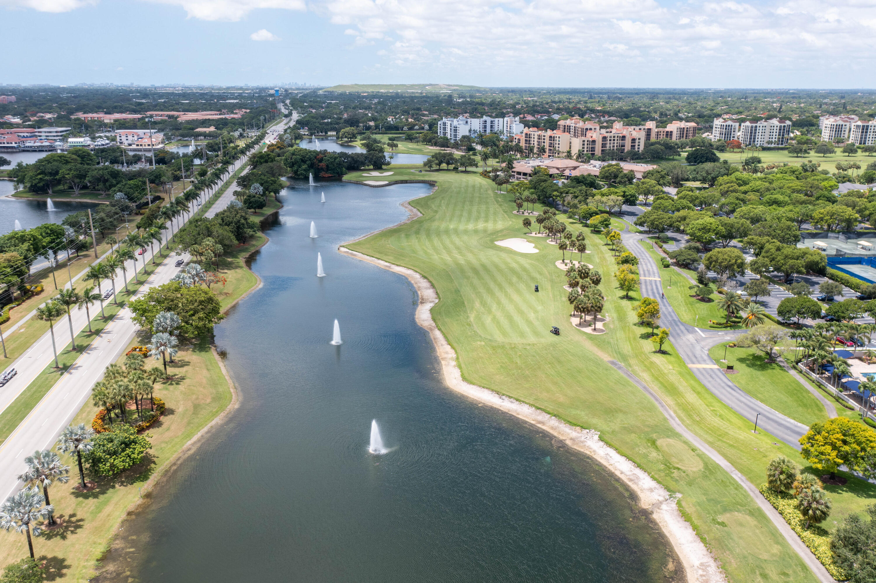 7520 La Paz Boulevard, Unit 104 Boca Raton, FL 33433 - Photo 50 of 56 an aerial view of residential houses with outdoor space