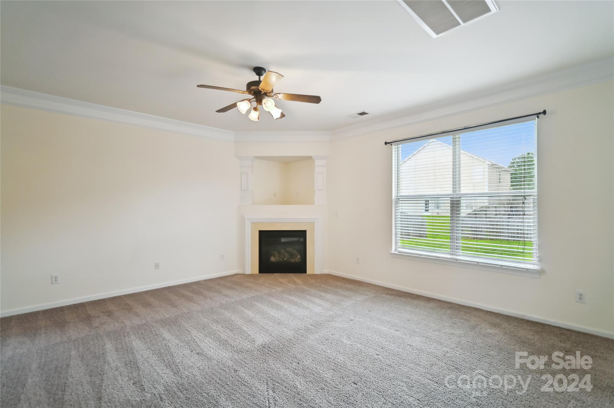 613 Latimer Way Monroe, NC 28110 - Photo 19 of 38 a view of an empty room with a window
