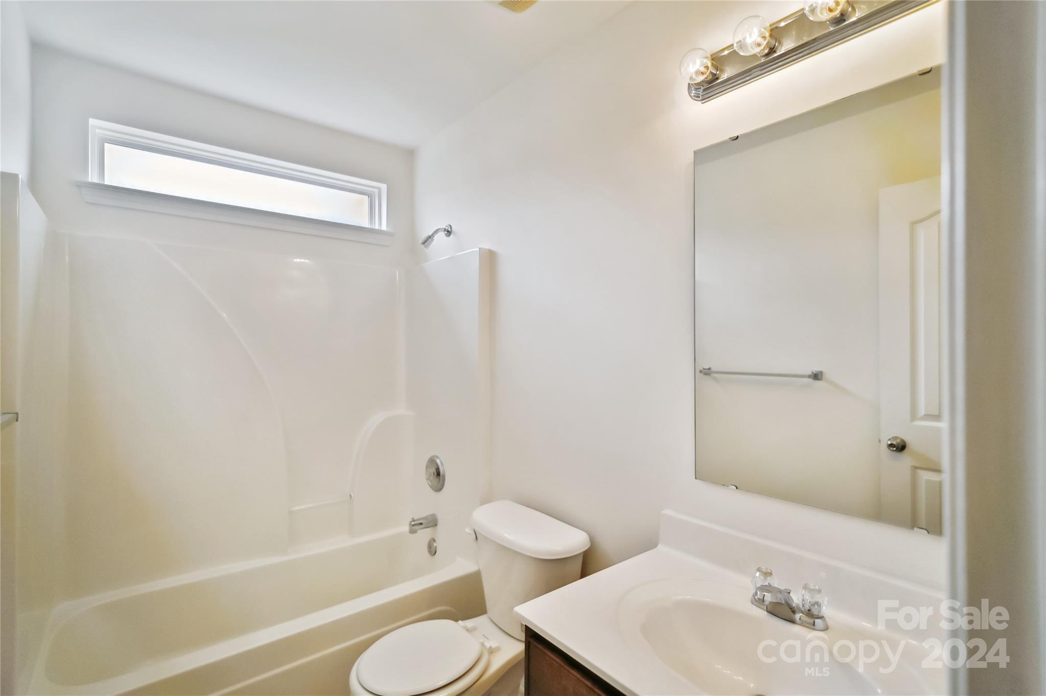 613 Latimer Way Monroe, NC 28110 - Photo 21 of 38 a bathroom with a sink toilet and shower