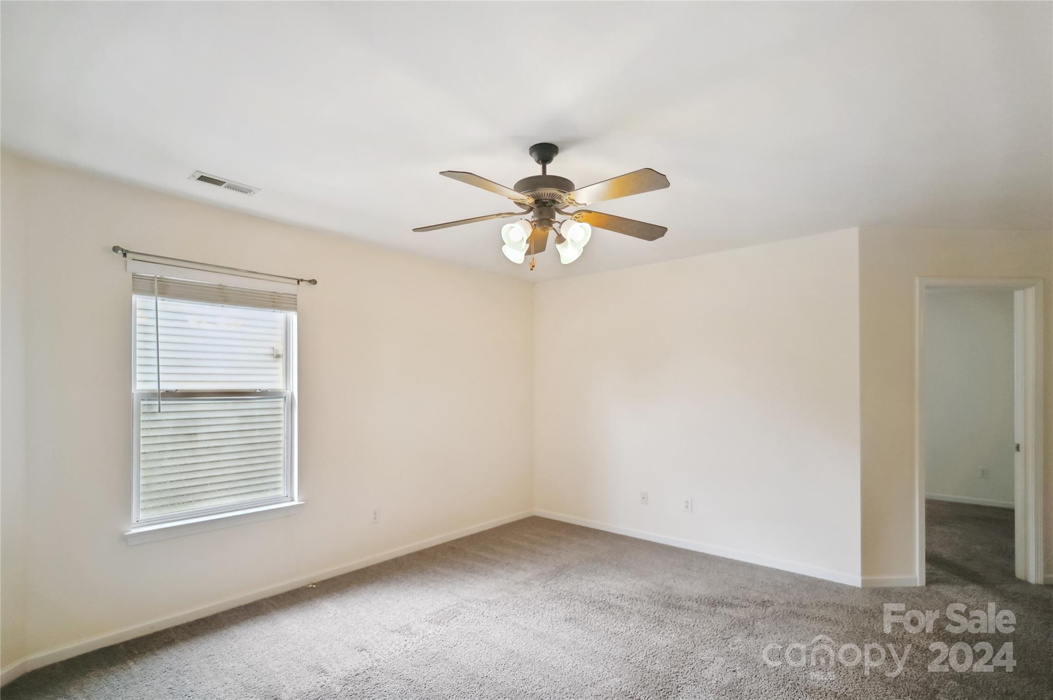 613 Latimer Way Monroe, NC 28110 - Photo 29 of 38 a view of an empty room with a window