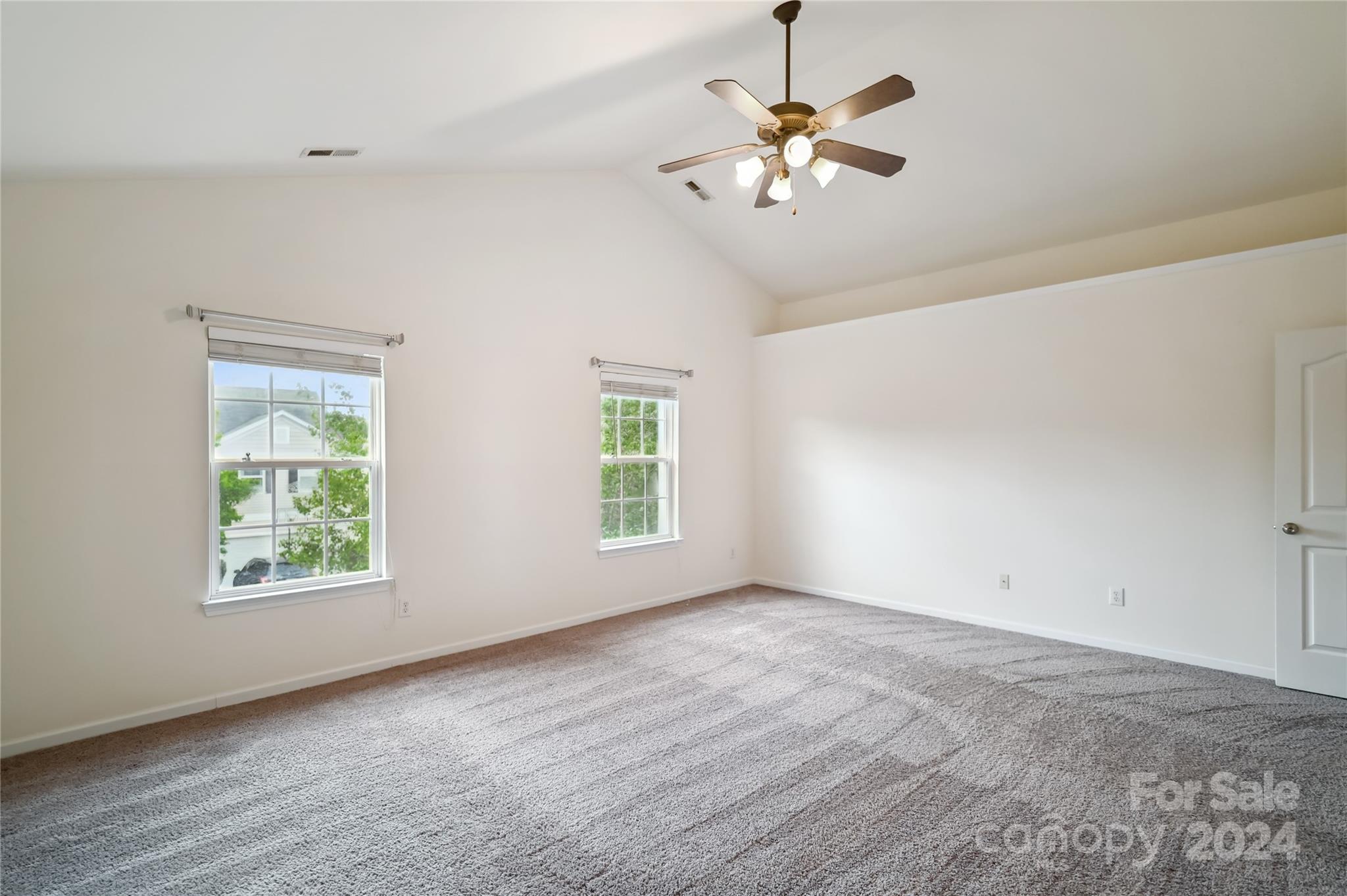 613 Latimer Way Monroe, NC 28110 - Photo 36 of 38 wooden floor in an empty room with a window