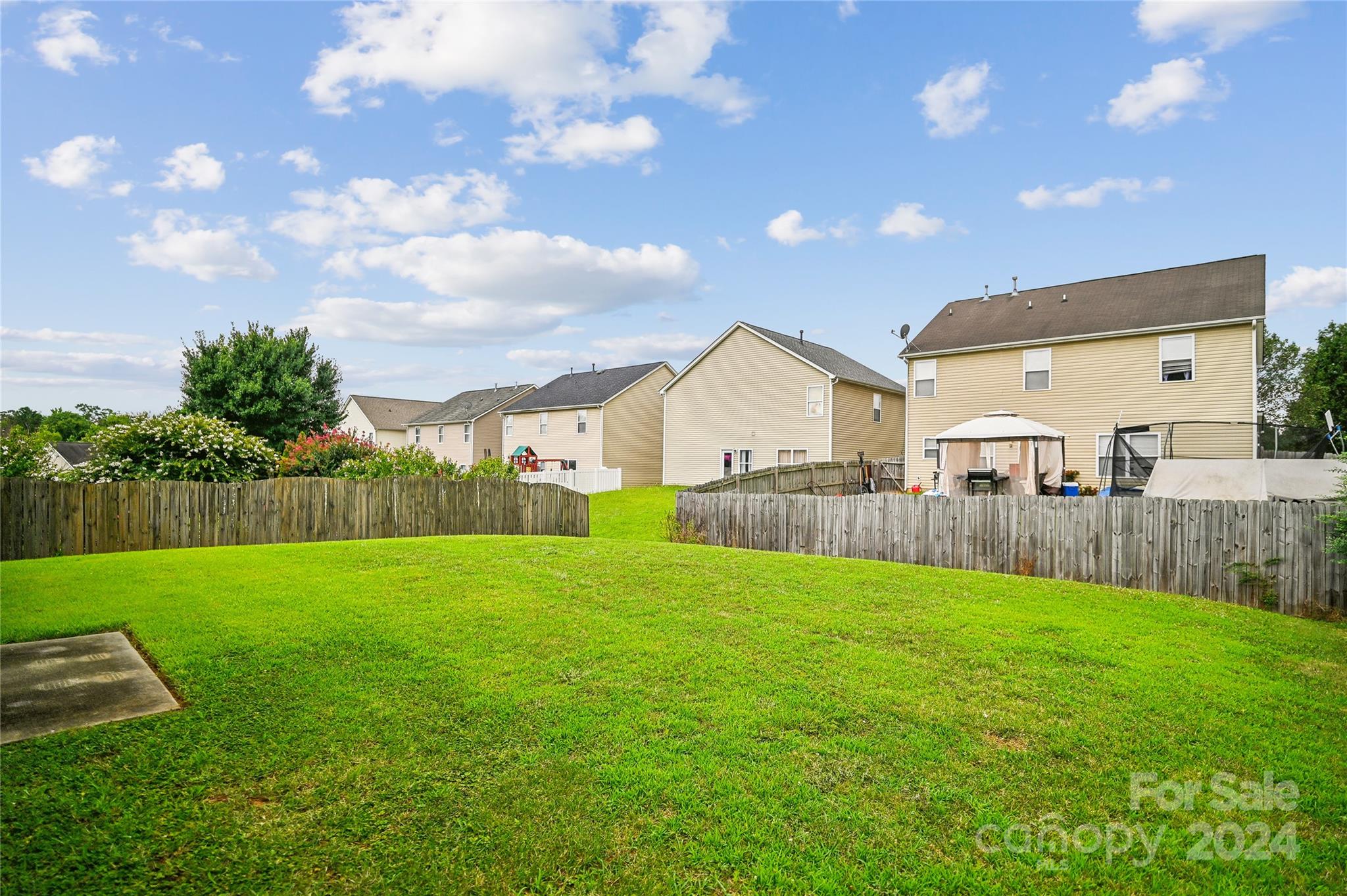 613 Latimer Way Monroe, NC 28110 - Photo 4 of 38 a view of a backyard of the house