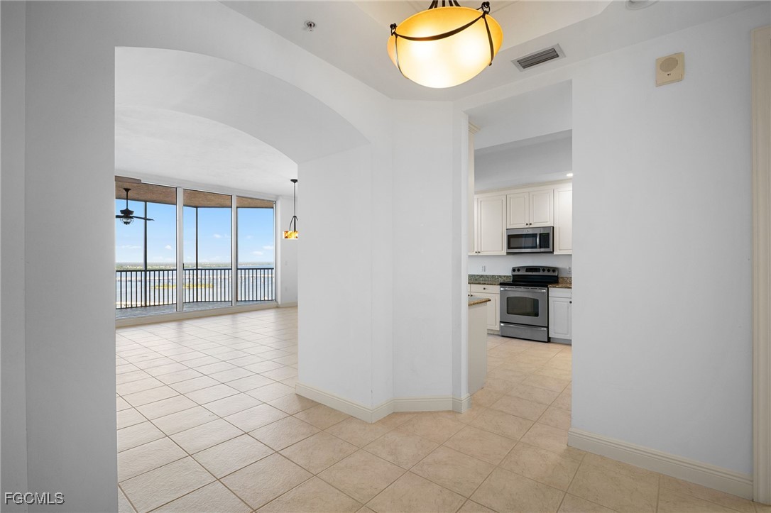2090 West First Street, Unit F2806 Fort Myers, FL 33901 - Photo 14 of 34 a view of a kitchen with a sink