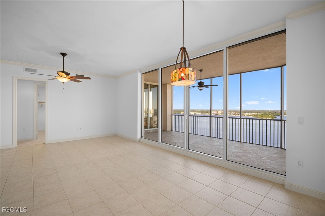 2090 West First Street, Unit F2806 Fort Myers, FL 33901 - Photo 16 of 34 a view of a room with sliding windows