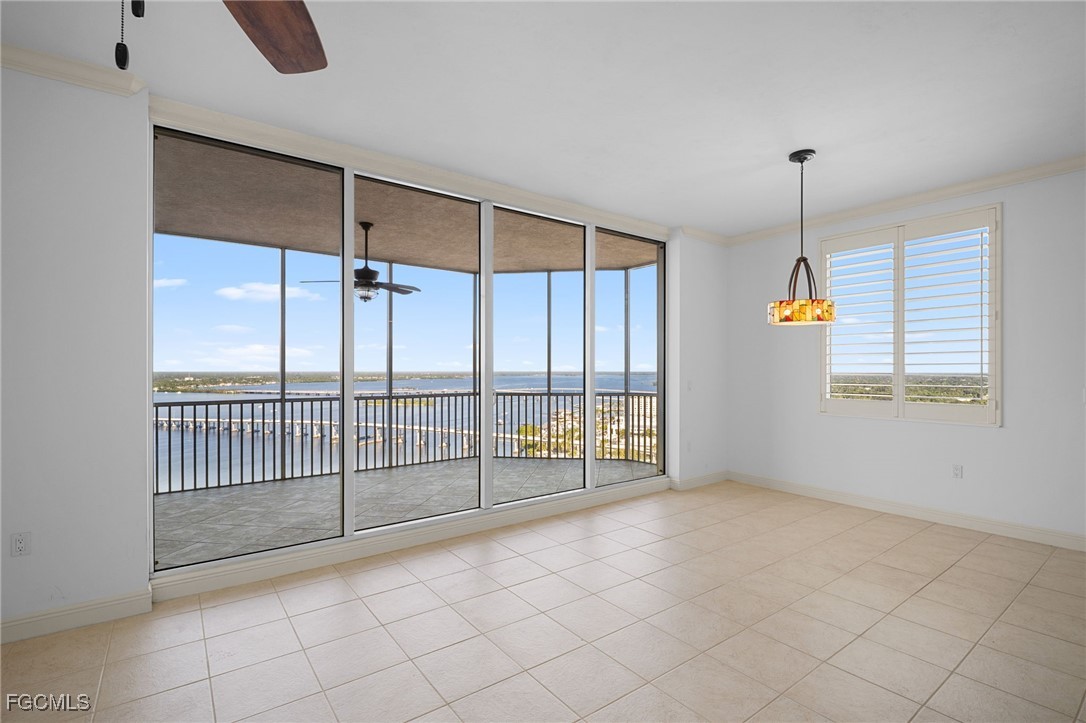 2090 West First Street, Unit F2806 Fort Myers, FL 33901 - Photo 17 of 34 a view of an empty room with a window