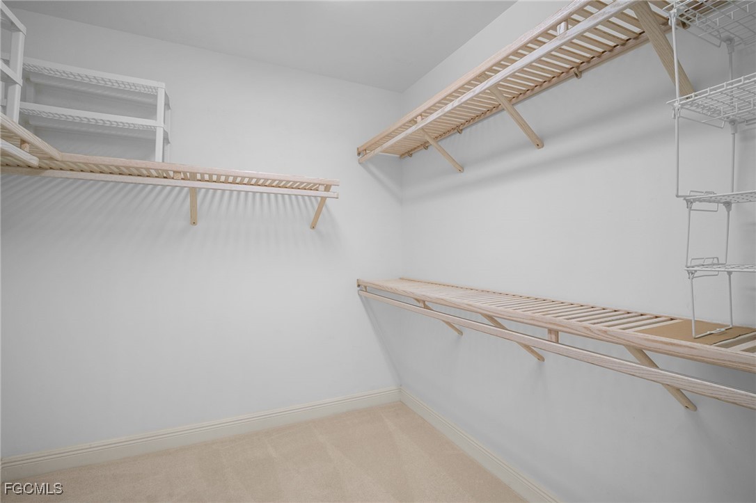 2090 West First Street, Unit F2806 Fort Myers, FL 33901 - Photo 24 of 34 a view of a room with racks on the wall