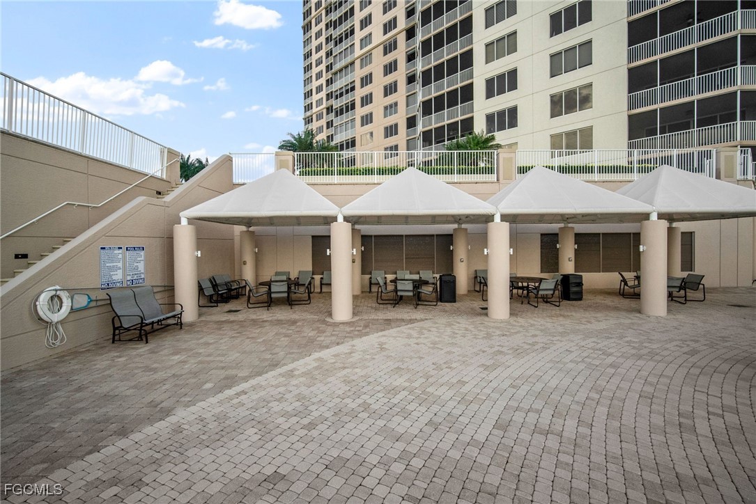 2090 West First Street, Unit F2806 Fort Myers, FL 33901 - Photo 29 of 34 a view of a building with a patio