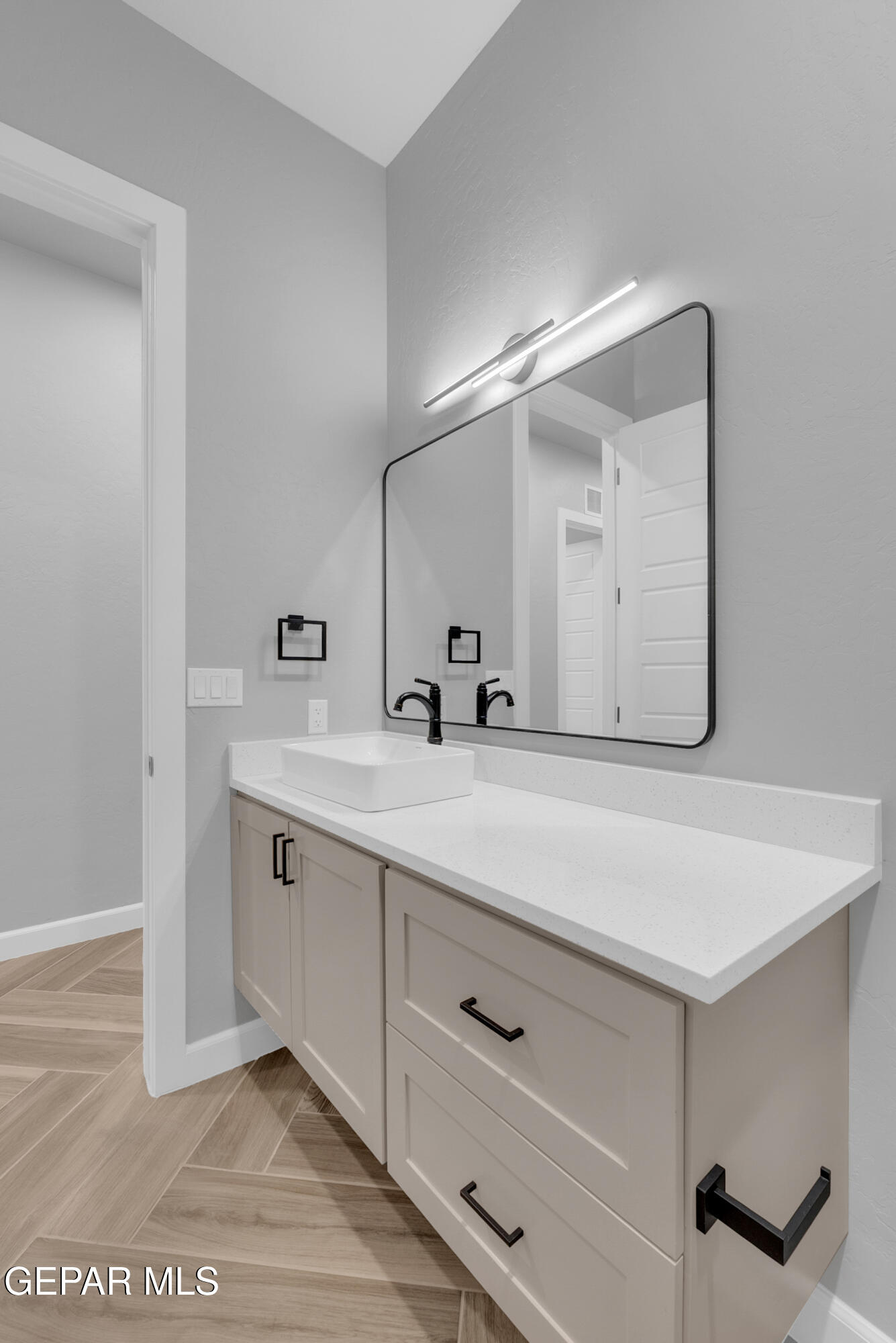 5612 Rio Bonito Circle El Paso, TX 79932 - Photo 48 of 79 a bathroom with a sink vanity and mirror