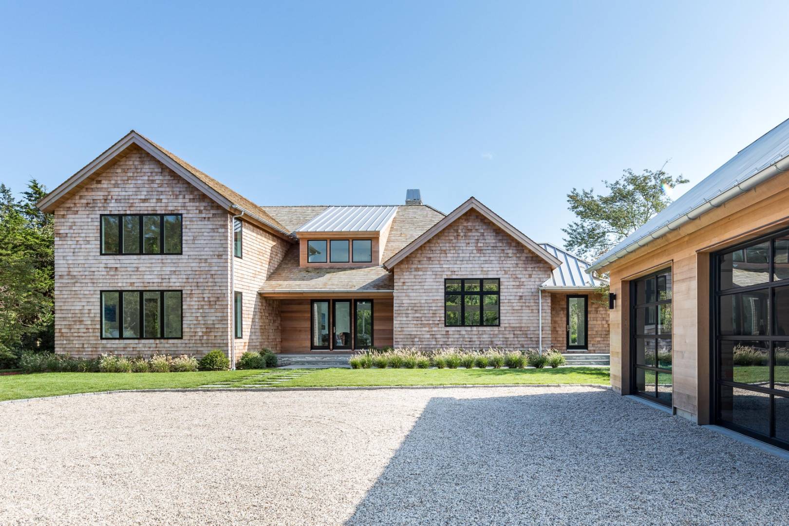 370 Pantigo Road East Hampton, NY 11937 - Photo 19 of 33 a front view of house with yard and green space