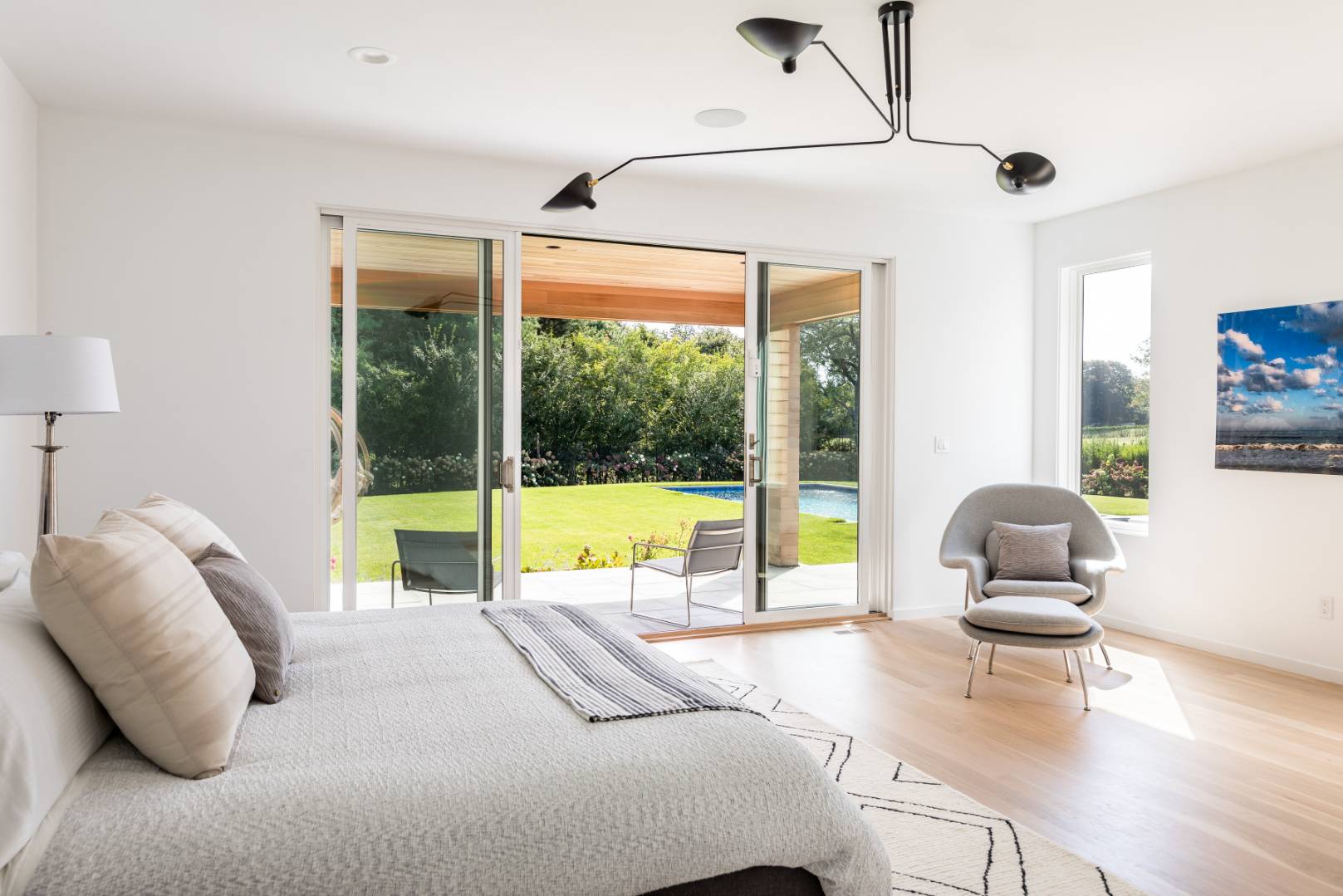 370 Pantigo Road East Hampton, NY 11937 - Photo 24 of 33 a living room with couch and large windows