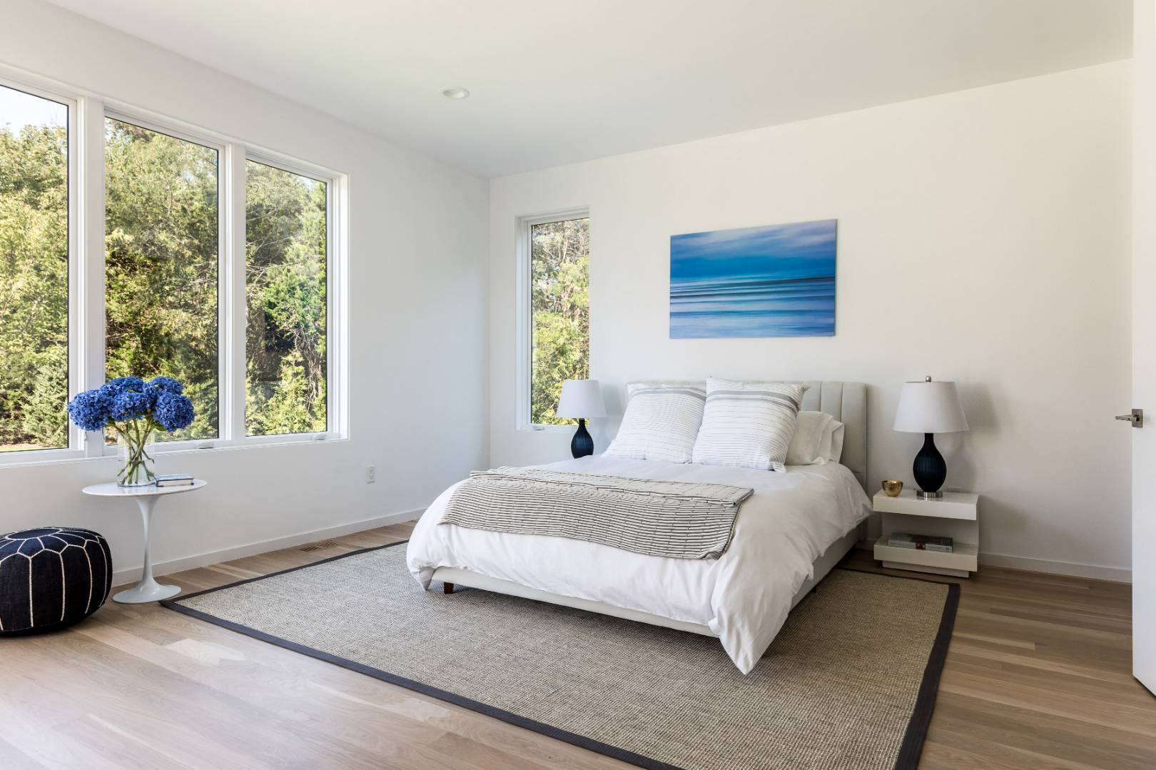 370 Pantigo Road East Hampton, NY 11937 - Photo 26 of 33 a bedroom with a bed and a window