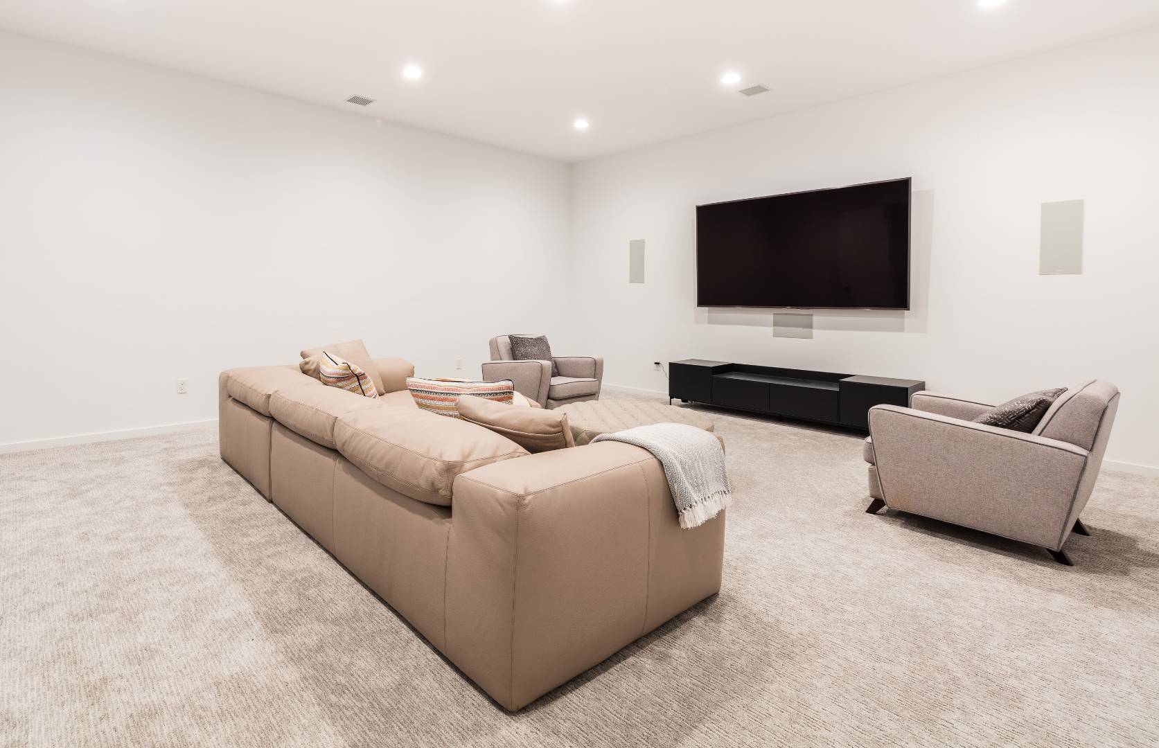 370 Pantigo Road East Hampton, NY 11937 - Photo 30 of 33 a living room with furniture and a flat screen tv