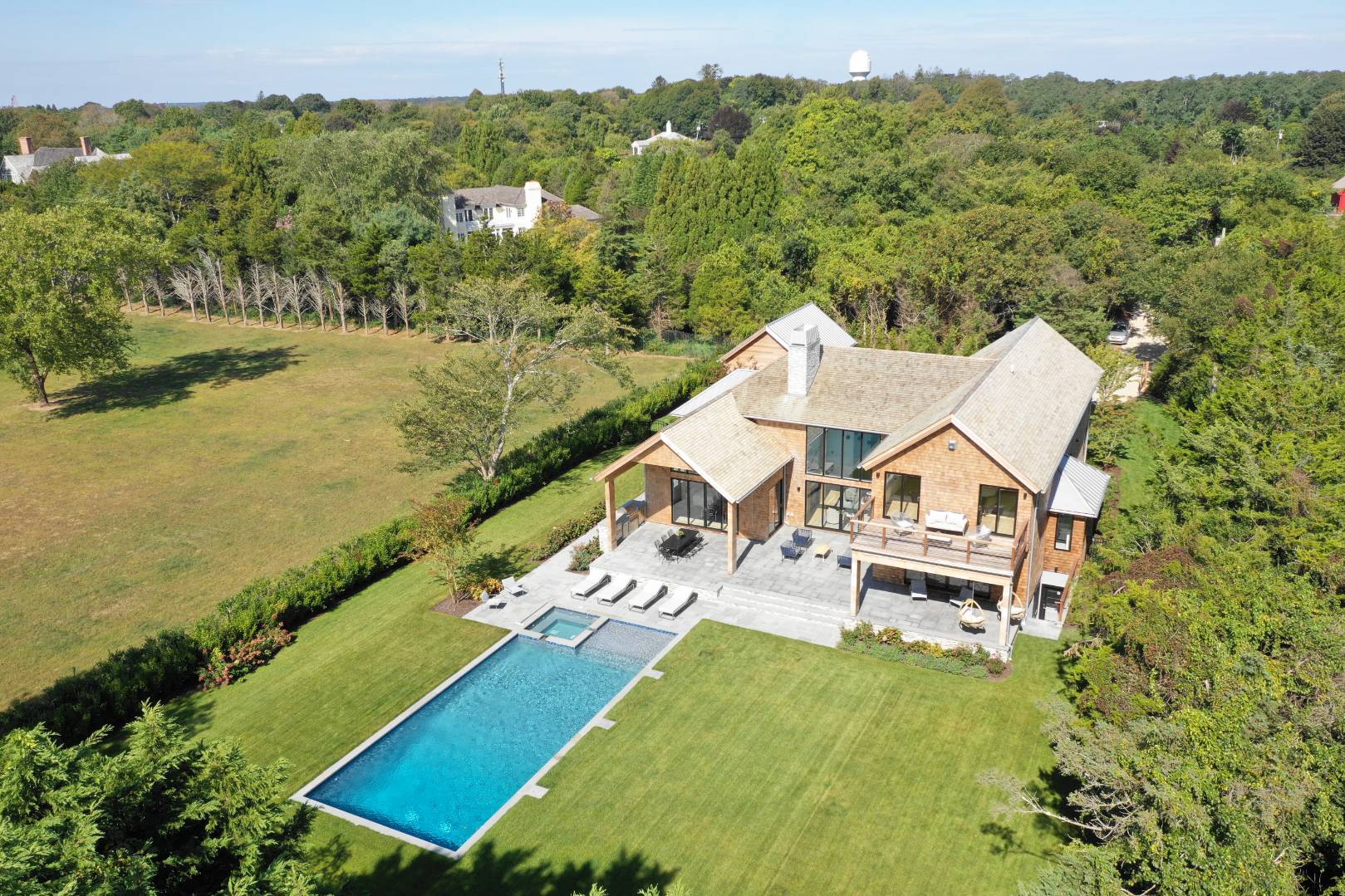 370 Pantigo Road East Hampton, NY 11937 - Photo 33 of 33 a view of a house with a yard and lake view