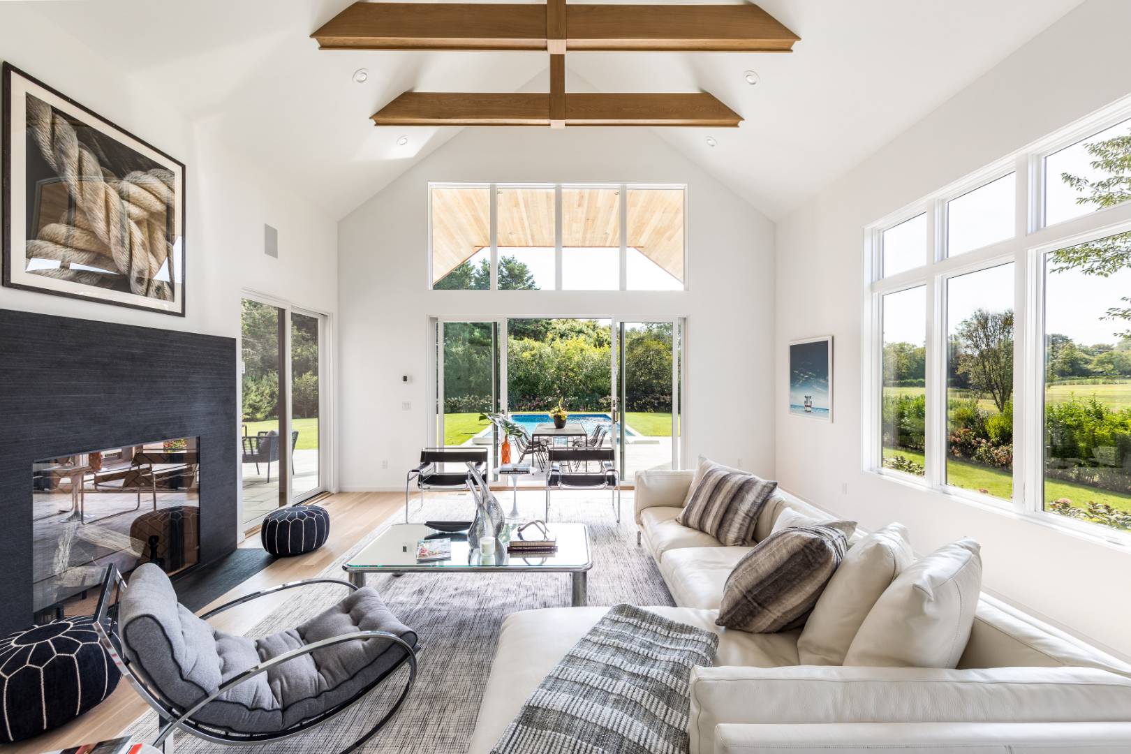 370 Pantigo Road East Hampton, NY 11937 - Photo 8 of 33 a living room with furniture and a large window