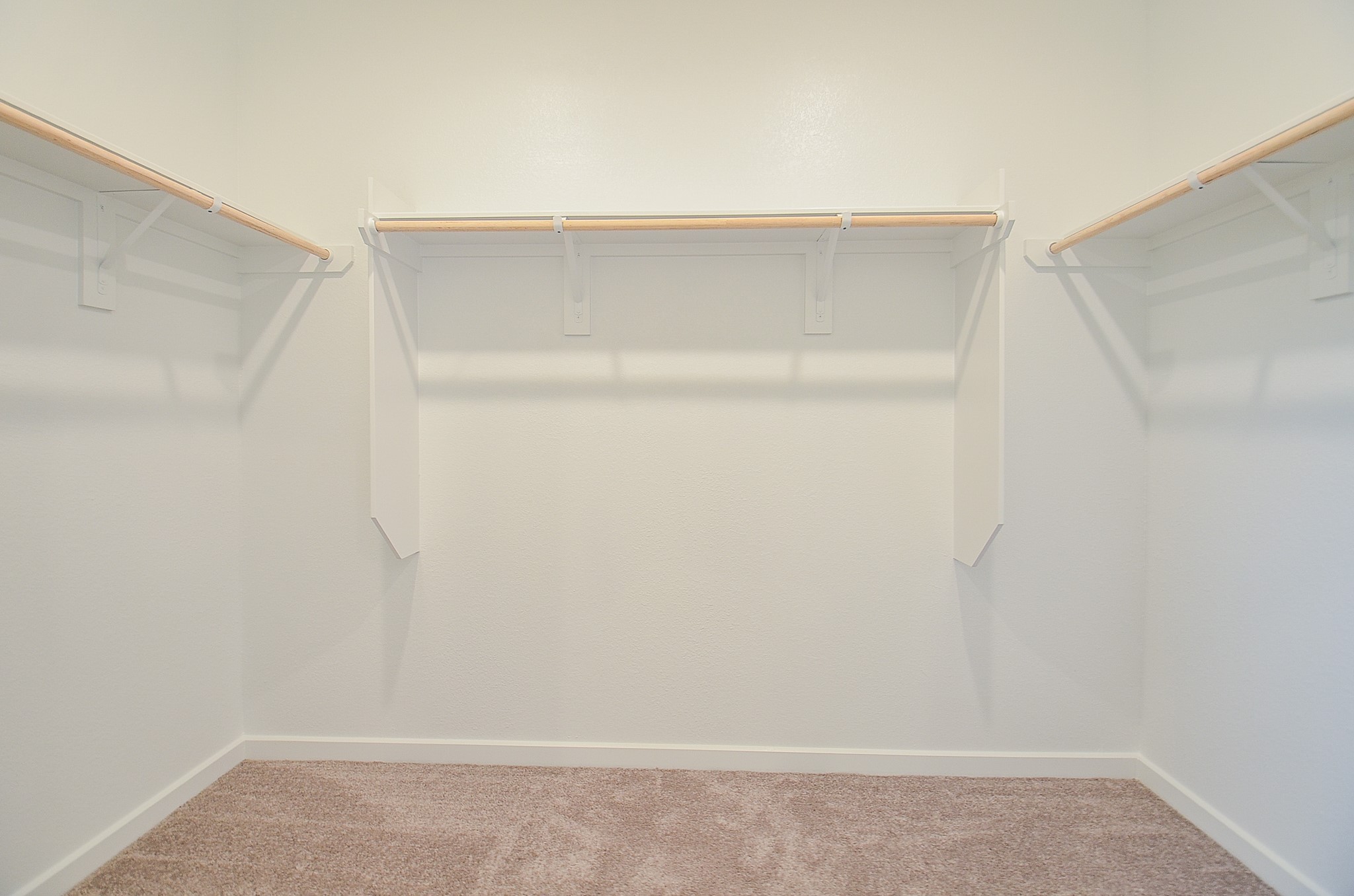 9727 Rialto Hts Drive Cypress, TX 77433 - Photo 26 of 37 This room features neutral carpeting, recessed lighting, and a tray ceiling, creating a bright and spacious atmosphere. Two large windows provide ample natural light.