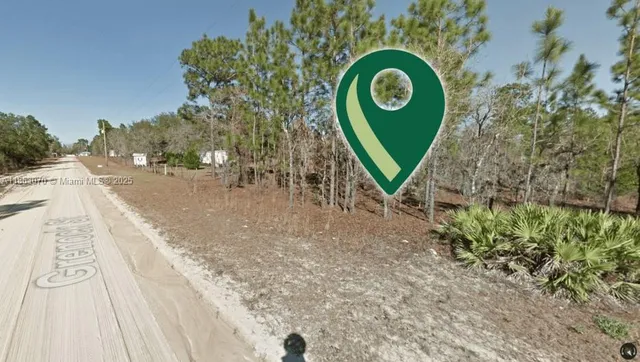 a view of a lake with a houses