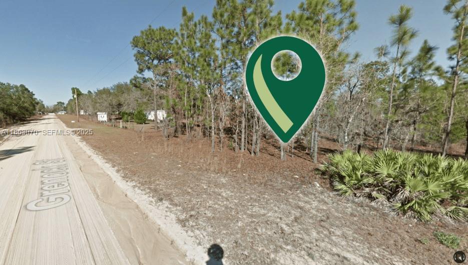 a view of a bench in a yard