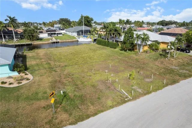 a view of residential space with swimming pool and lake view