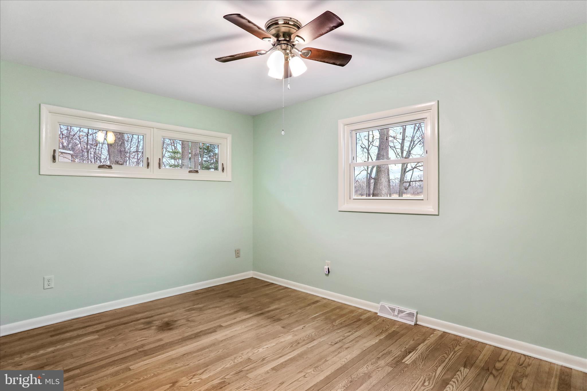 19734 Longmeadow Road Hagerstown, MD 21742 - Photo 16 of 45 a view of a hallway with a painting on the wall
