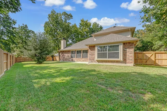 a house view with a garden space