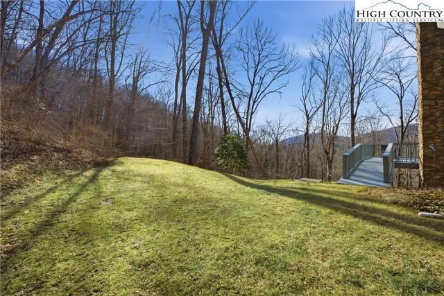 a view of a pathway with a yard