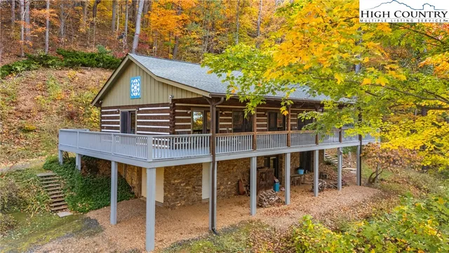 a view of house with a iron gate