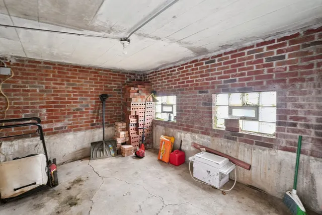 a room with furniture and a window