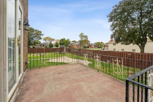 a view of a fence in front of a building