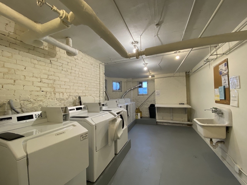 1 Dana Street, Unit 2 Cambridge, MA 02138 - Photo 11 of 11 a utility room with dryer and washer