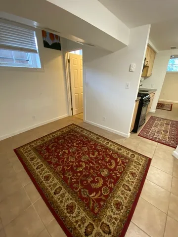 a kitchen that has a sink and a stove