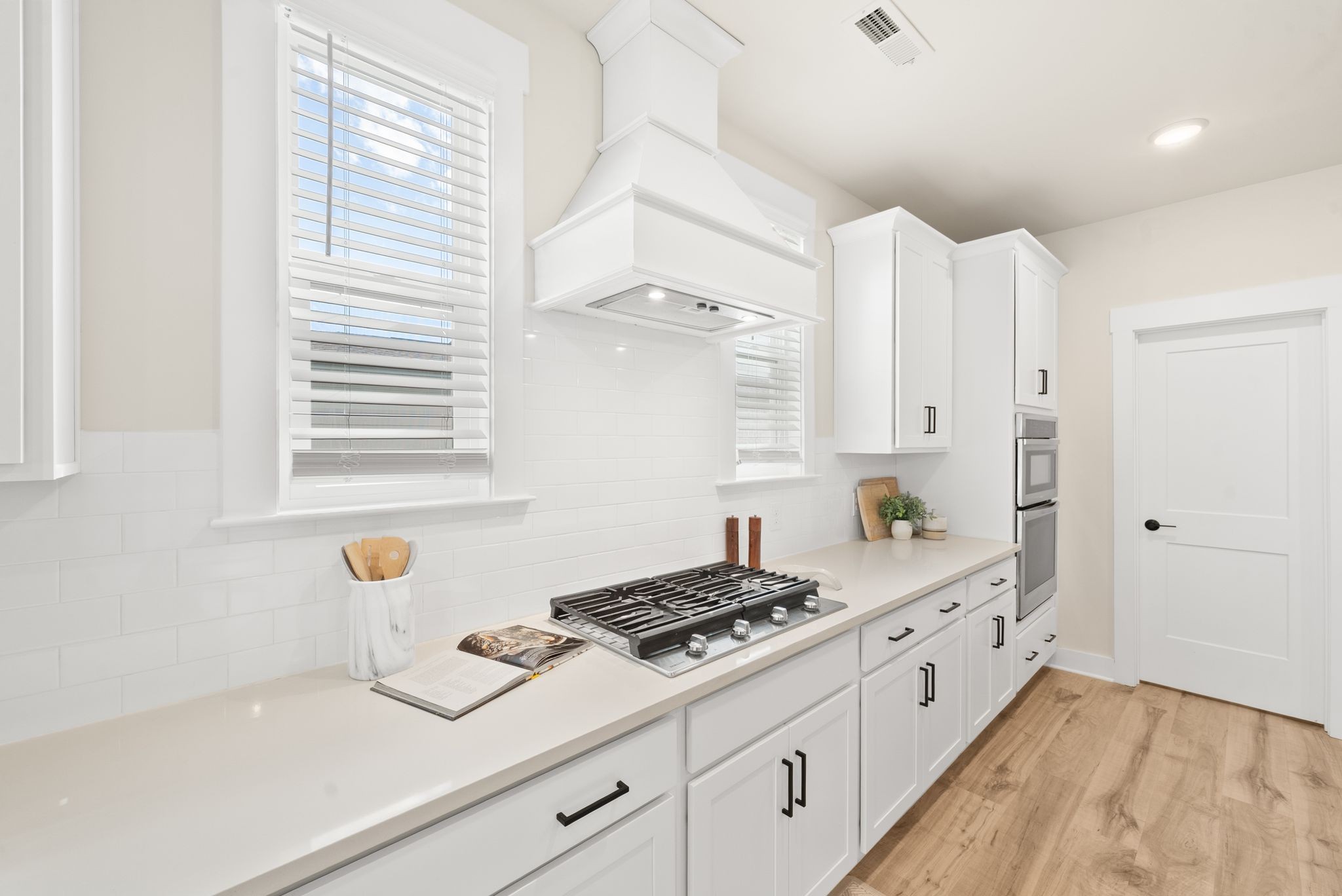 4043 John Marsh Road Spring Hill, TN 37174 - Photo 27 of 56 a kitchen with stainless steel appliances sink cabinets and window
