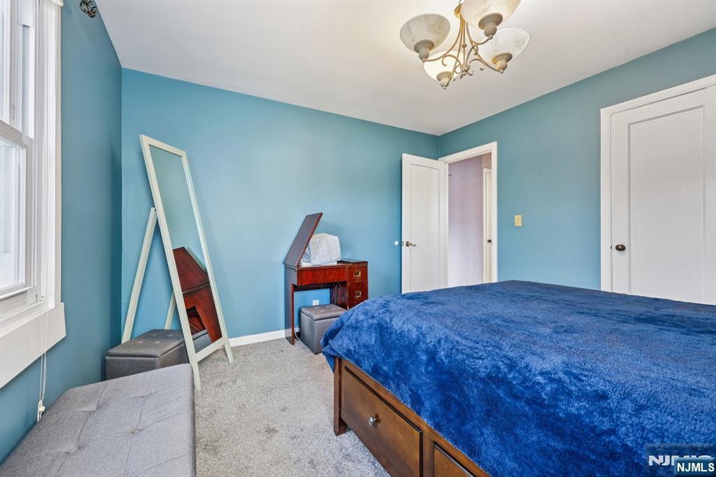 18 Scher Place Passaic, NJ 07055 - Photo 11 of 22 a bed room with a bed
