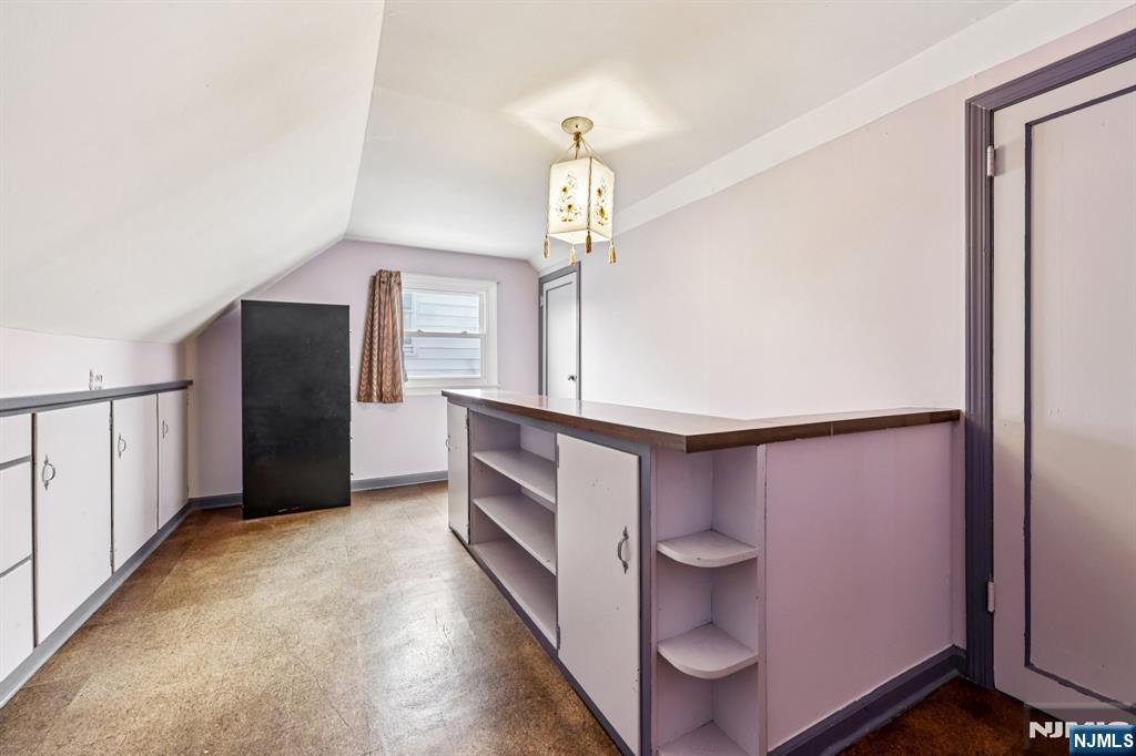 18 Scher Place Passaic, NJ 07055 - Photo 16 of 22 a view of an empty room with window and bathroom