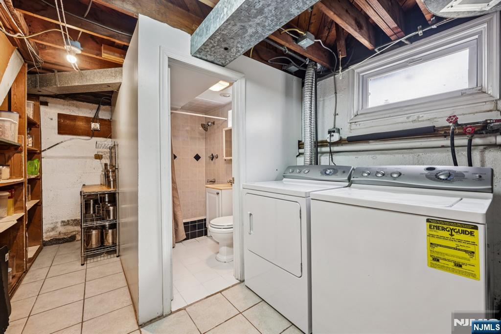 18 Scher Place Passaic, NJ 07055 - Photo 18 of 22 a utility room with dryer and washer