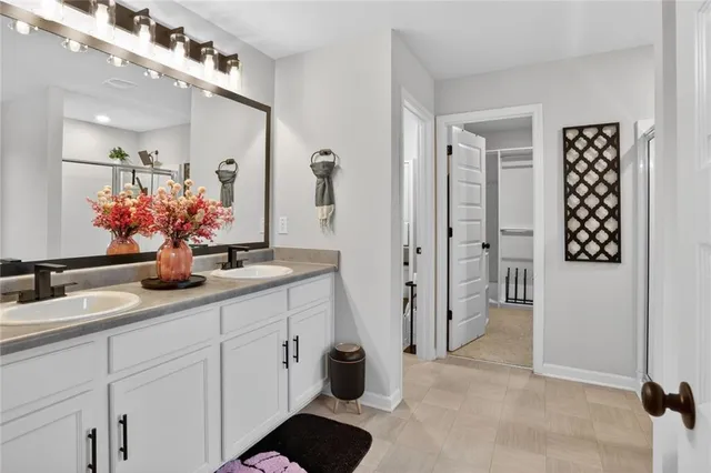 a bathroom with a shower and a tub