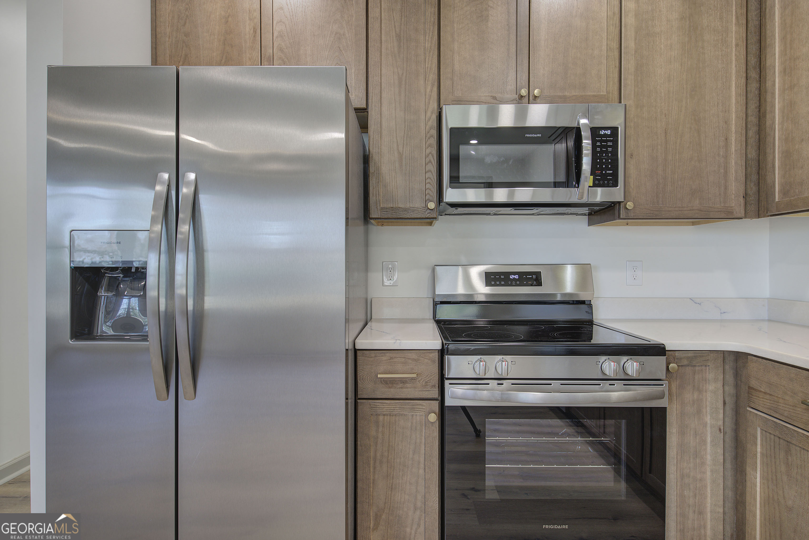 117 East Boundary Street Southeast Rome, GA 30161 - Photo 11 of 36 a kitchen with a refrigerator stove and microwave