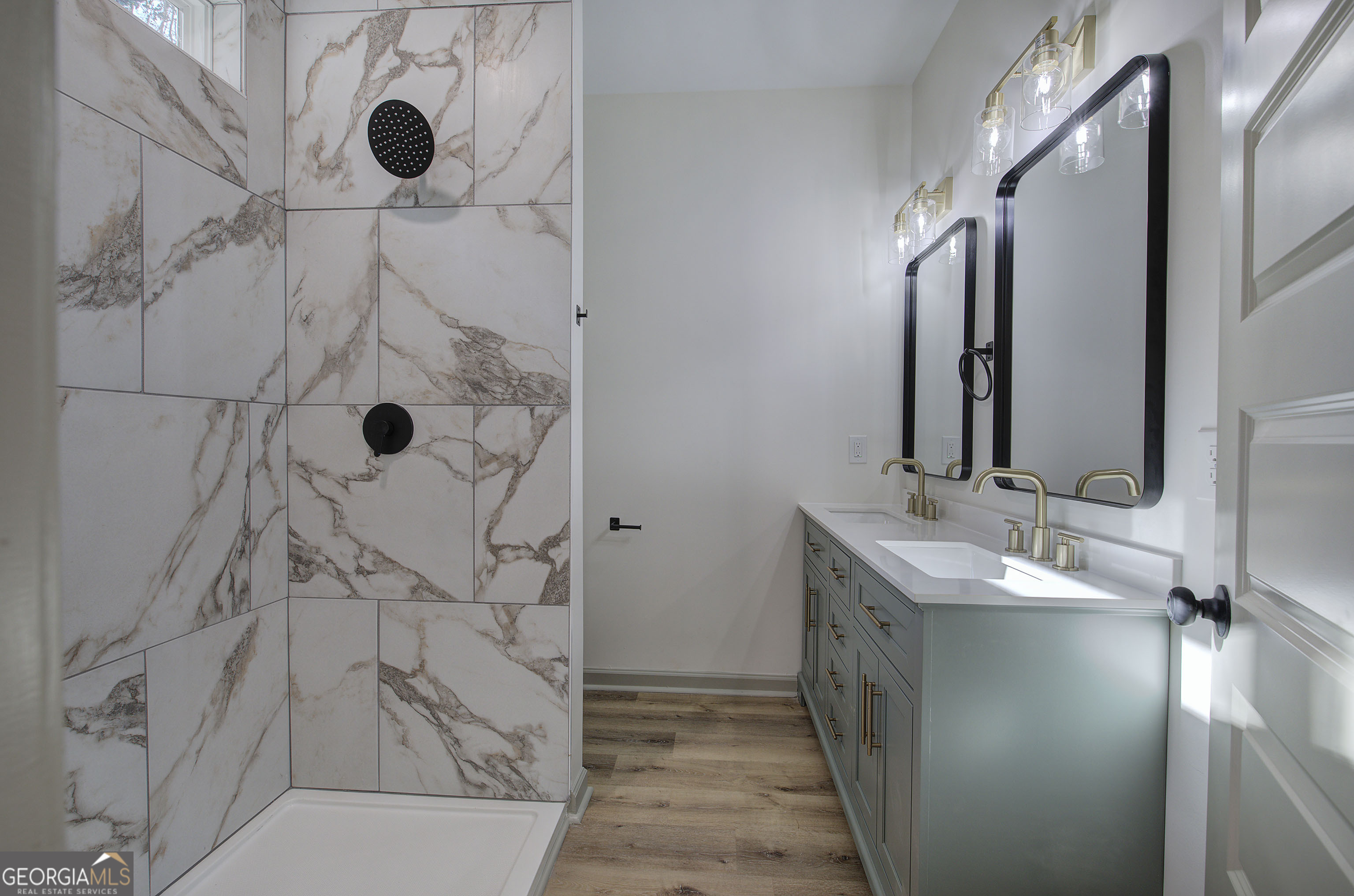 117 East Boundary Street Southeast Rome, GA 30161 - Photo 21 of 36 a bathroom with a double vanity sink mirror and shower