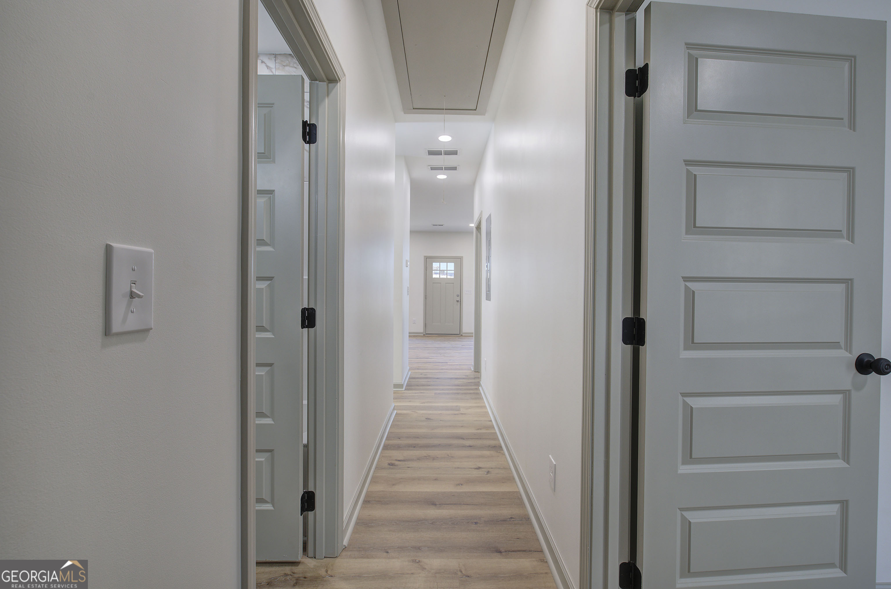 117 East Boundary Street Southeast Rome, GA 30161 - Photo 23 of 36 a view of a hallway with wooden floor and closet