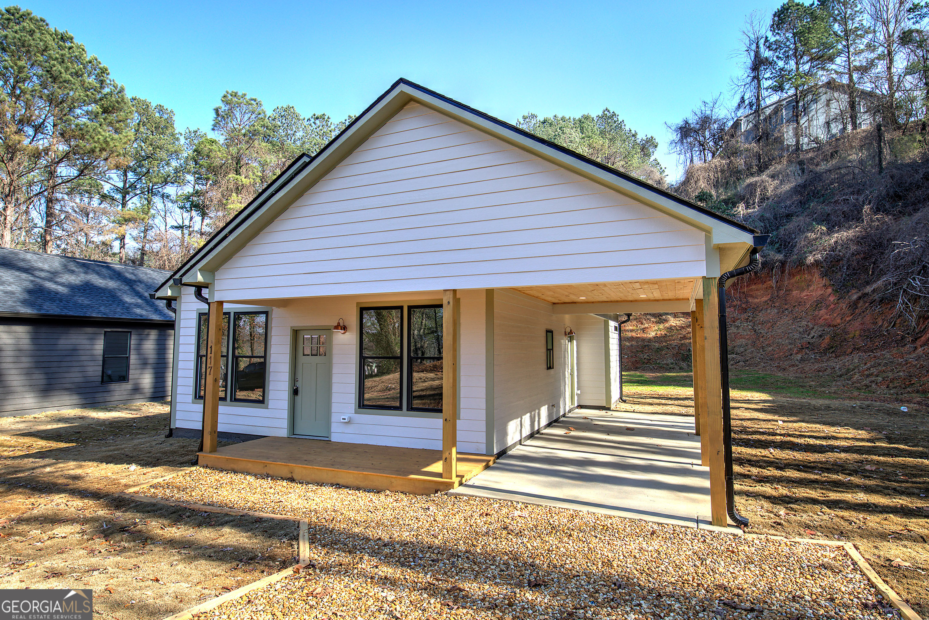 117 East Boundary Street Southeast Rome, GA 30161 - Photo 29 of 36 a view of a house with a patio