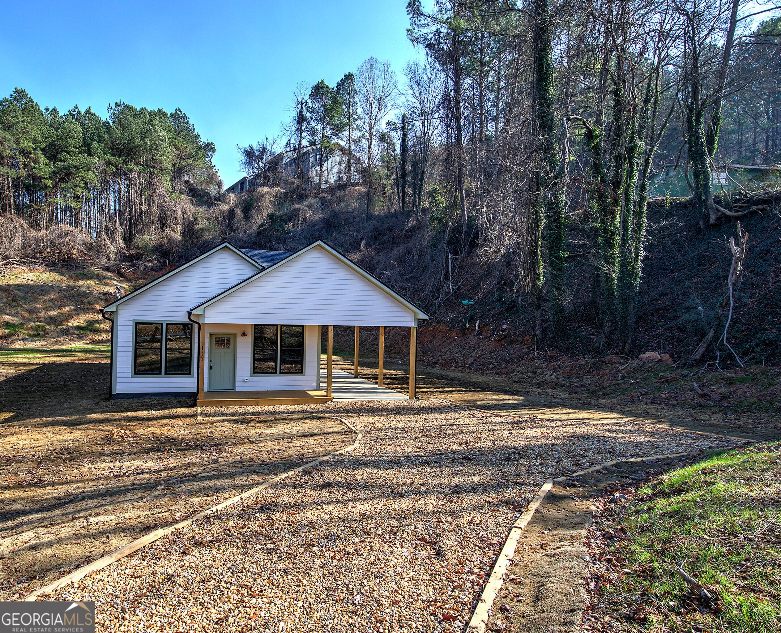 117 East Boundary Street Southeast Rome, GA 30161 - Photo 30 of 36 a house with trees in front of it