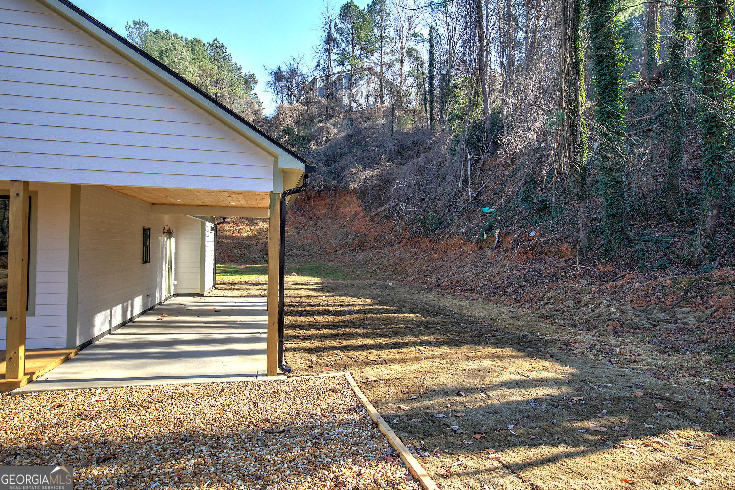 117 East Boundary Street Southeast Rome, GA 30161 - Photo 31 of 36 a view of a house with backyard and trees